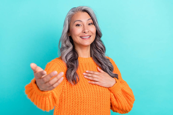 Portrait of attractive cheerful kind friendly candid grey-haired woman calling you isolated over bright teal turquoise color background. - Photo, Image