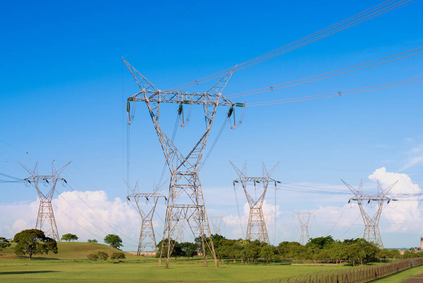Electric power lines coming out from a Itaipu dam, Parana State, Brazil - Photo, Image