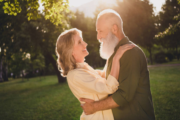 Profile photo of opimistic emotion old grey hair couple hug wear trend shirts outside spend free time - Фото, зображення