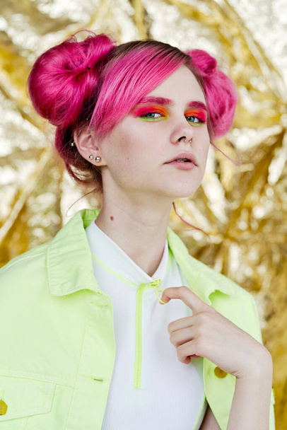 pretty woman pink hair bright makeup golden background - Фото, зображення