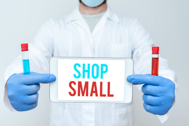 Hand writing sign Shop Small. Business concept nationwide movement that celebrates small businesses every day Research Scientist Presenting New Medicine, Researching Preventive Measure - Photo, Image