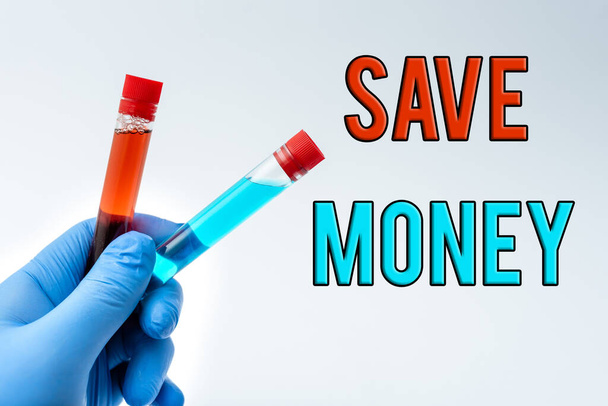 Writing displaying text Save Money. Word Written on store some of your cash every month to use them sometime later Presenting Medical Samples Laboratory Testing New Virus Medicine - Valokuva, kuva