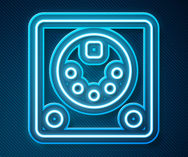 Glowing neon line Drum machine icon isolated on blue background. Musical equipment.  Vector. - Vector, Image