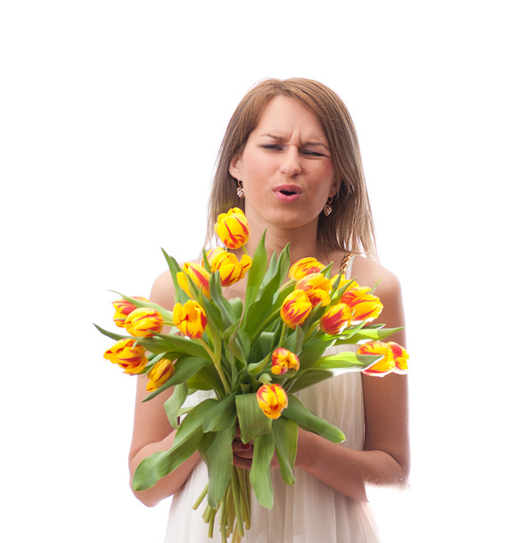 Beautiful  blonde woman with tulips bouquet - Fotó, kép