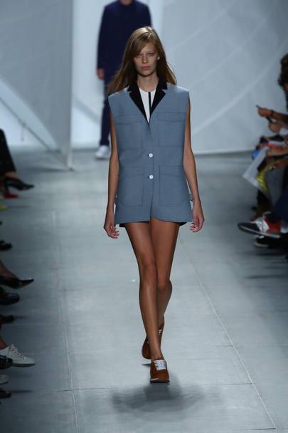 Model walks the runway at Lacoste during Mercedes-Benz Fashion Week - Foto, imagen
