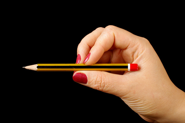 Female hand holding pencil isolated - Foto, imagen