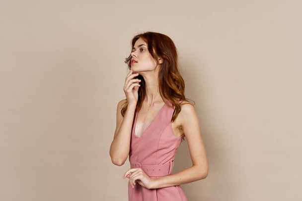 woman in pink dress glamor posing model isolated background - 写真・画像