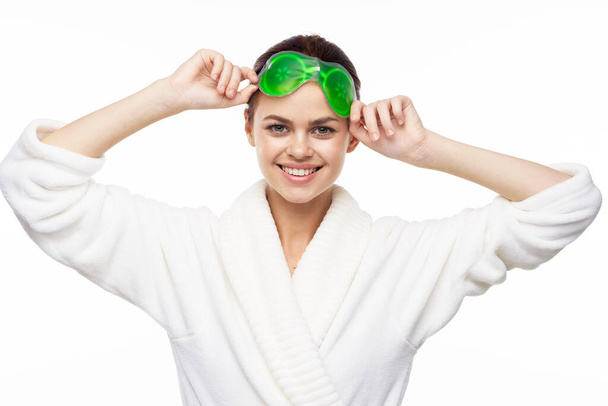 cheerful woman in a white robe facial care rejuvenation lifting - Photo, Image
