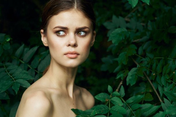 portrait of a woman green leaves clean skin nature summer model - Photo, Image