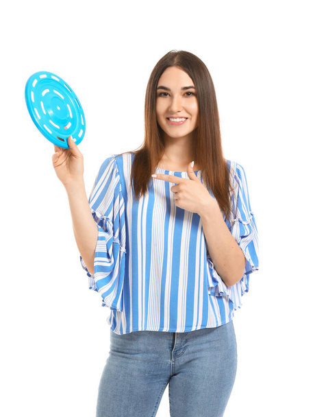 Beautiful young woman with frisbee disk on white background - Foto, Imagem