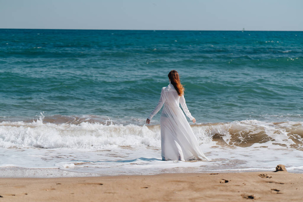 beautiful woman white dress walk beach freedom Fresh air - Foto, Imagen