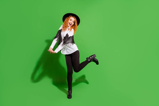 Full length body size view of pretty girlish cheerful girl dancing having fun event isolated over bright green color background - Valokuva, kuva