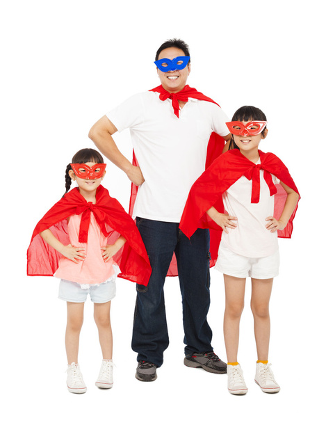 Vater und Töchter im Superheldenanzug. isoliert auf weiß - Foto, Bild