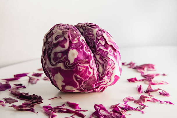 Red cabbage cut in a shape of brain. Concept photo. - Photo, Image