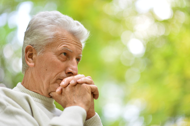 Senior man thinking about something - Foto, afbeelding
