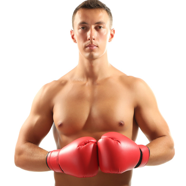 Handsome young muscular sportsman with boxing gloves isolated on white - Foto, Bild