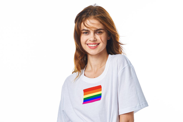 woman wearing white t-shirt lgbt flag inventor community - Foto, afbeelding