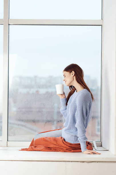 woman near the window dreamy look rest at home comfort - Φωτογραφία, εικόνα