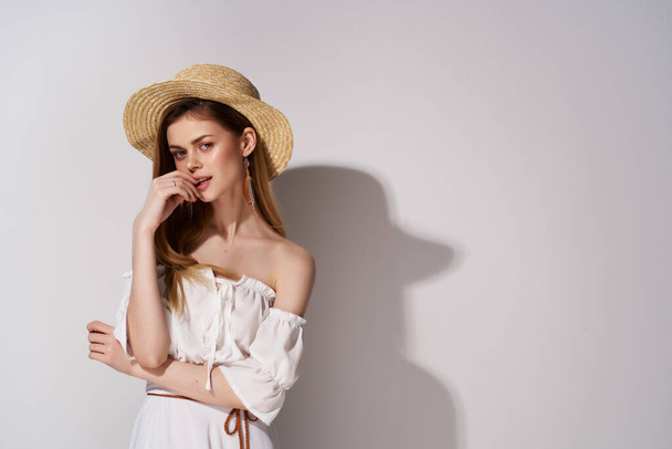 woman wearing hat cosmetics posing fashion light background - Foto, Bild