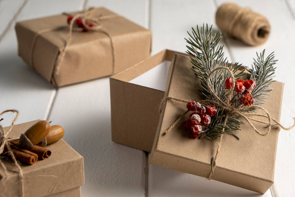 Christmas DIY present on white wooden background - Foto, Bild