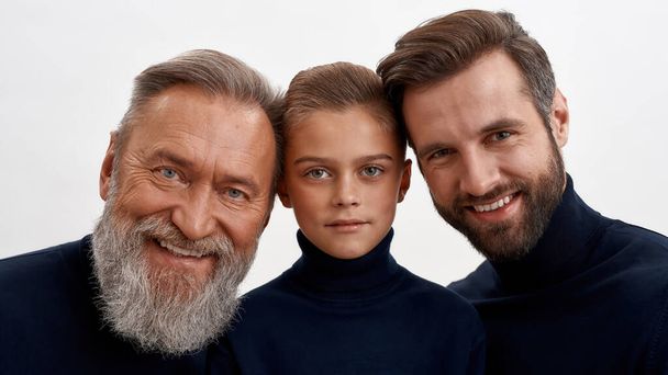 Portrait of smiling three generations of Caucasian men - Фото, зображення