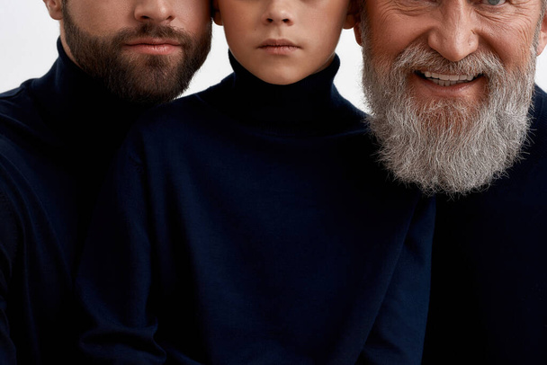 Crop picture of three male generations together - Foto, Bild
