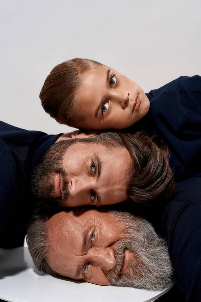 Portrait of three male generations heads faces - Zdjęcie, obraz