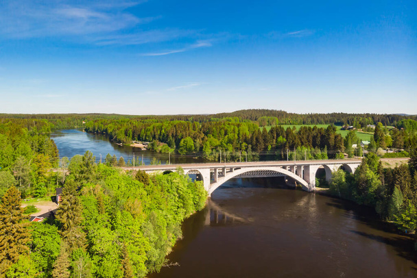 Summer aerial view of bridge and Kymijoki river waters in Finland, Kymenlaakso, Kouvola, Koria - Fotografie, Obrázek