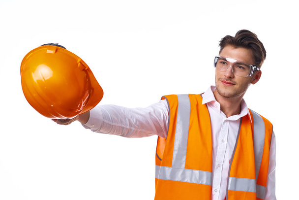 man in work uniform orange helmet safety professional work - Φωτογραφία, εικόνα