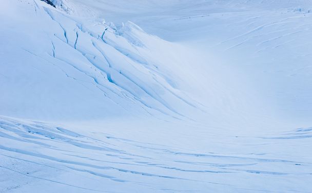 Snowy mountains - Фото, зображення