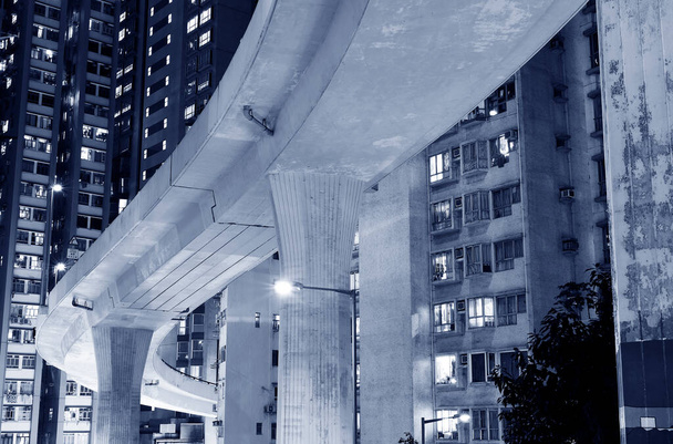 Night scenery of over bridge through downtown district in Hong Kong city - Photo, Image