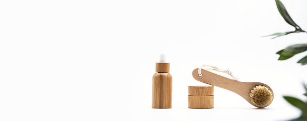 Bath bamboo brush, eco-friendly bamboo bottle and jar. Set of natural cosmetic products. Zero waste. No plastic concept. - Photo, Image