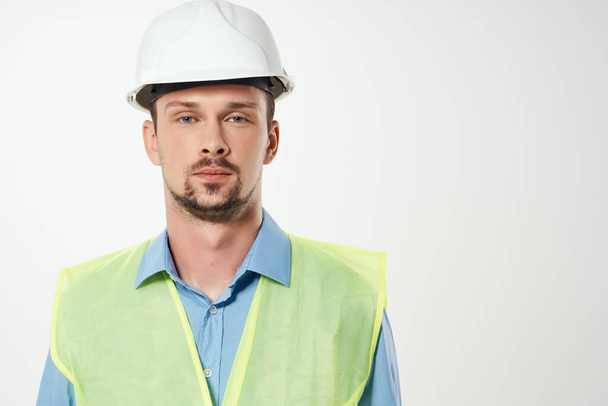 Man reflective vest emotions professional light background - Foto, Imagem