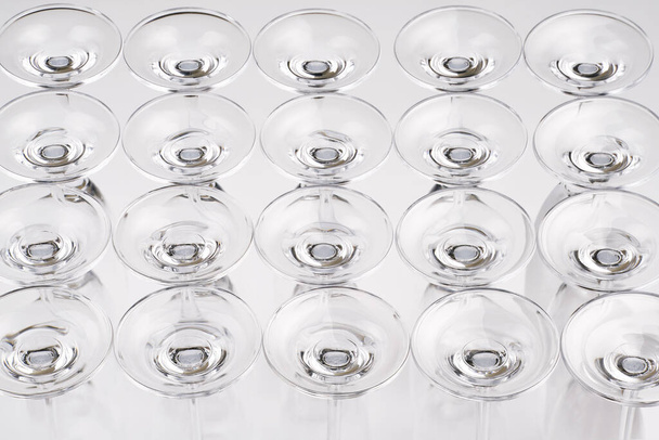 Clear glases placed on a white background. - Foto, Bild