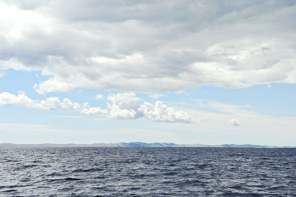 grey clouds over Adriatic Sea in Dalmatia - Photo, Image