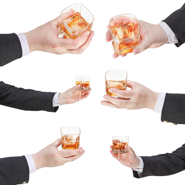 set of whiskey glass in businessman hand - Photo, Image