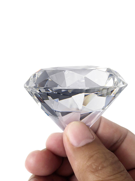 diamantový šperk v ruce, izolovaných na bílém pozadí - Fotografie, Obrázek