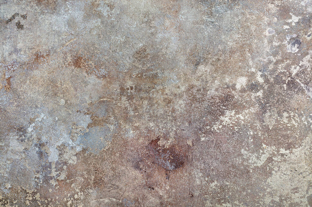 The mottled texture of canvas and old plaster in beige, brown and gray tones as part of a classic design in a retro style. - Photo, Image