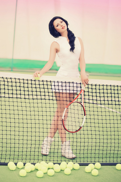Femme jouant au tennis
 - Photo, image