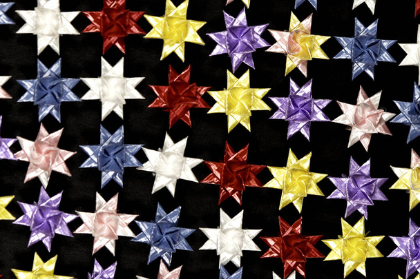 De vouwbare papieren sterren. Kleurrijk patroon. - Foto, afbeelding