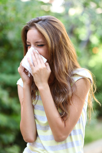 Young girl with allergy outdoors - Photo, Image
