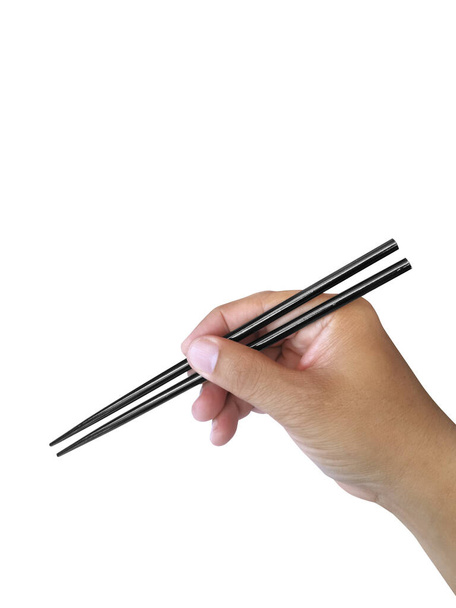 Hand Holding Chopsticks Isolated on White Background - Foto, imagen