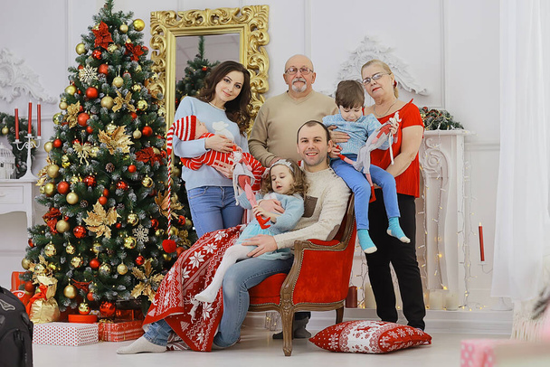 big family in new year christmas holidays, grandmother, grandfather, parents and children - Photo, Image
