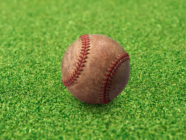 Baseball on the clear green grass turf close-up - Foto, imagen
