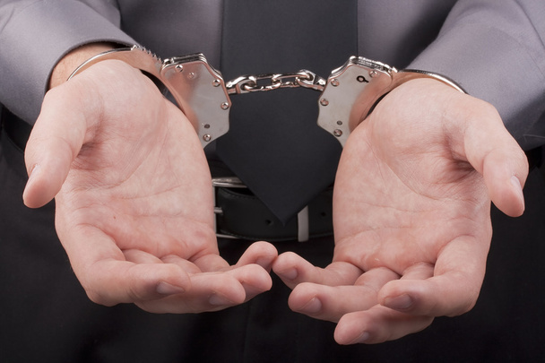 Arrest handcuffs - 写真・画像