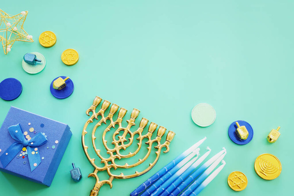Religion image of jewish holiday Hanukkah background with menorah (traditional candelabra), spinning top and candles - Φωτογραφία, εικόνα
