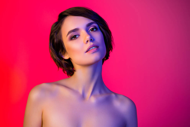 Photo of cute brown hairdo young lady without clothes isolated on vibrant neon red color background - Фото, зображення