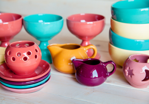 colorful tableware on a wooden background - Foto, immagini