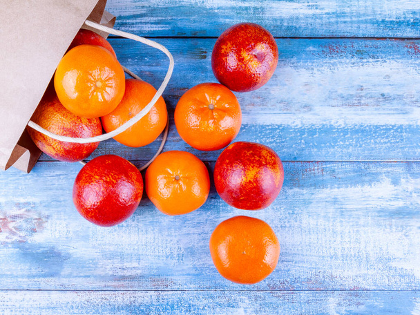 Fresh red oranges on the table - Photo, Image