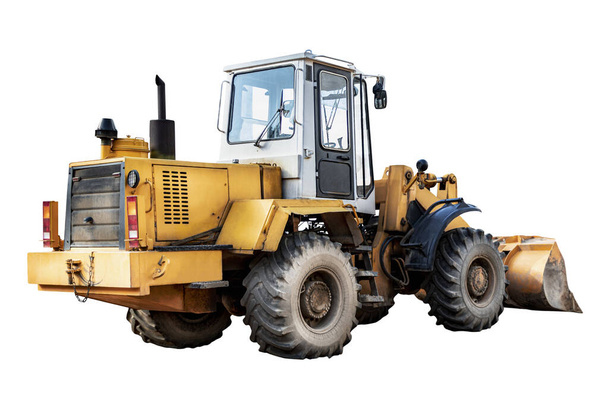 Heavy front loader on a white isolated background. Construction machinery. Transportation and movement of bulk materials - Photo, Image